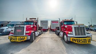 Two American trucks delivered the containers to Fermilab.