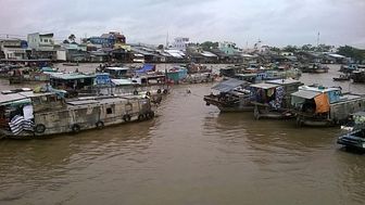Floating market on the Mekong River in Vietnam