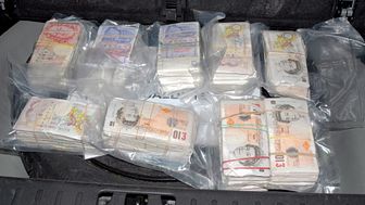 Two sentenced for dirty cash scam 