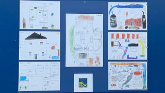 Designs from the pupils at Christ the King Catholic Primary School on the hoarding to the development BoKlok on the Brook in Bristol.