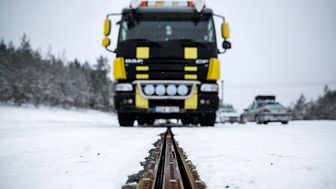 PostNords lastbilar på elväg vid Airport City Stockholm