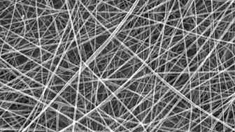 Elektronmikroskopibild av nanofibrer, som används vid tillverkning av munskydd som filtrerar virus