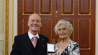 Audrey Broad receiving her 'Order of Mercy' award 