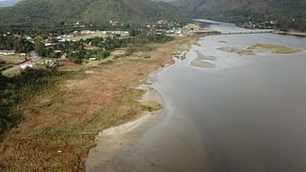 Aerial view of the Chaihuín tidal marsh – site of the discovery of new geological evidence for a previously unreported historical tsunami.