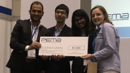 Students from Normandy Business School receive a cheque for €1,000.