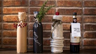 Att slå in en flaska vin - tre kreativa sätt att göra paket av en vinflaska