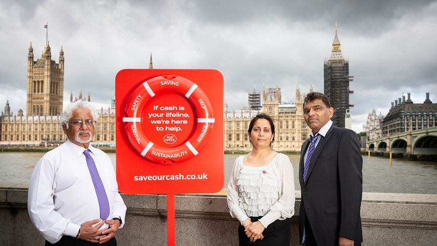Naresh Patel (Branch Manager of Westminster Bridge Post Office), Bharti Patel (Postmaster at Churchill Place Post Office) and Subhash Patel (Postmaster at Canary Wharf Post Office) promoting 'Save Our Cash Day'