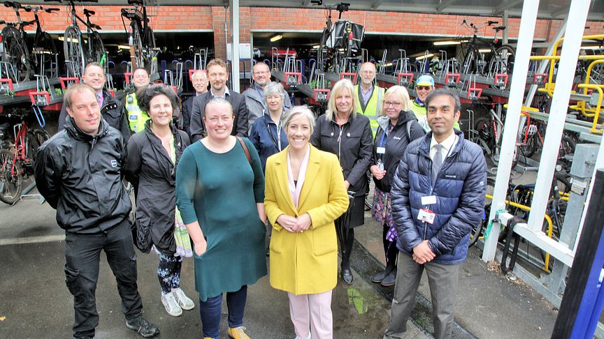 Open sesame: Daisy Cooper MP (centre, yellow jacket) opens St Albans' cycle hub flanked by Station Manager Harsitt Chandak (right) and ward councillor Jacqui Taylor and other Thameslink and community representatives - more pictures below