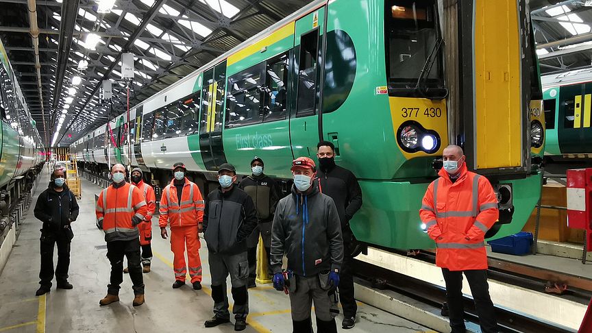 GTR Overhaul Manager Peter Hewitt (right) and his team with the updated Electrostar 377430 at Selhurst Depot