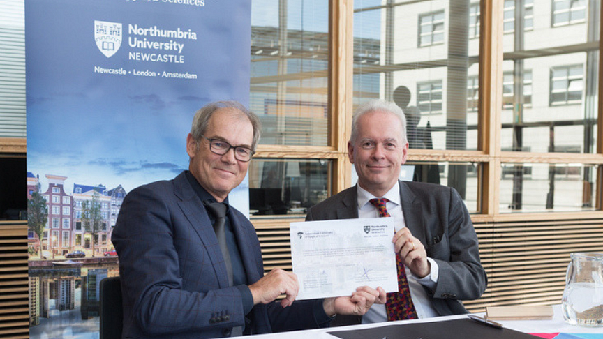 l-r Dr Geleyn Meijer and Professor Andrew Wathey in Amsterdam with the signed partnership document