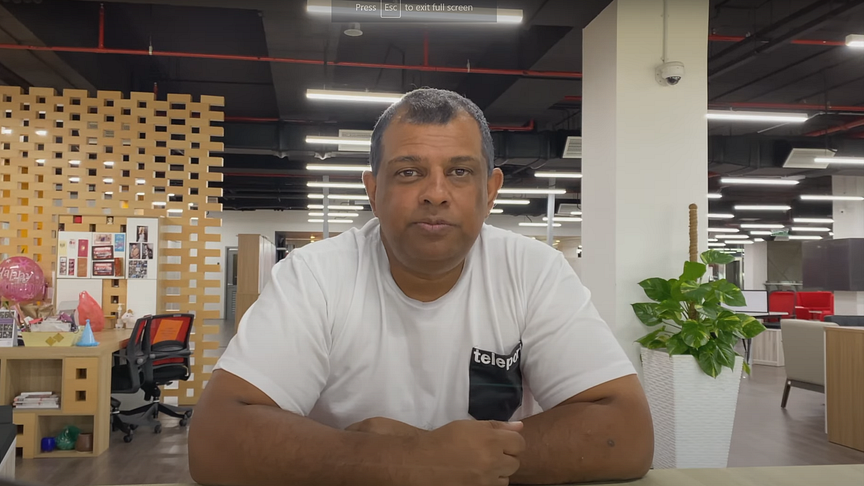 Tony Fernandes talking about AirAsia's refund issues in a video