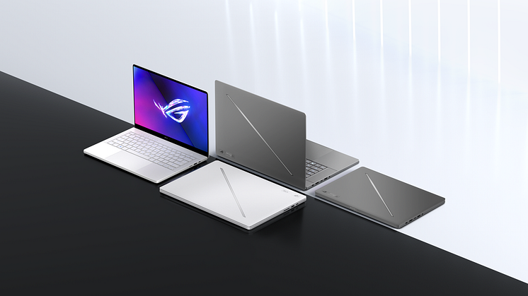 Two 2024 Zephyrus G14 laptops and two Zephyrus G16 laptops, with one each in Eclipse Gray and Platinum White, back to back and separated by a gray and white background