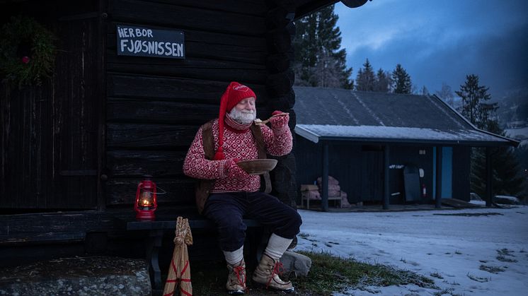 Fjøsnisse - a Nisse eating Christmas porridge. Photo: Bastian Fjeld/VisitNorway