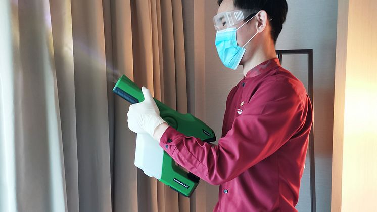 Housekeeping Attendant disinfecting guest room at PARKROYAL on Beach Road with the Professional Cordless Electrostatic Handheld Sprayer.jpg