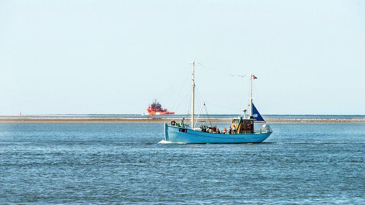The Fisheries and Maritime Museums cutter E1 with an ESVAGT vessel in the background