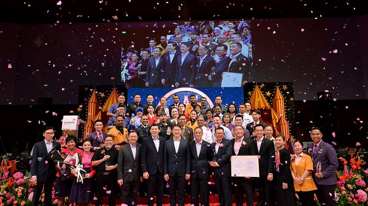 AAC 2019 award recipients celebrating their win with Minister Lam Pin Min