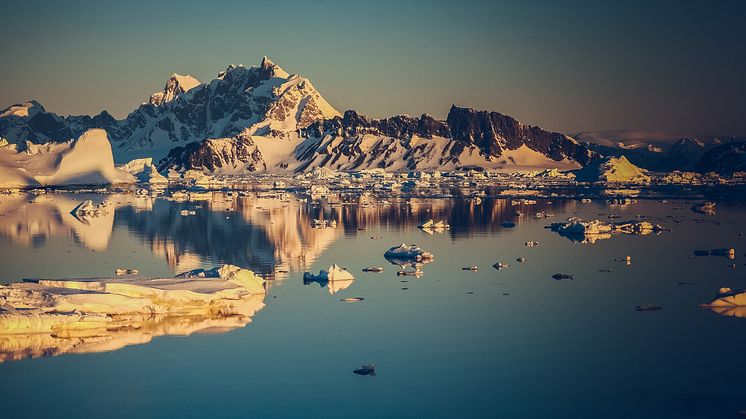 Sea ice reflections around Rothera Point, home to a research station and British Antarctic Survey (BAS) base on the Antarctic Peninsula. Photo by Steve Gibbs.