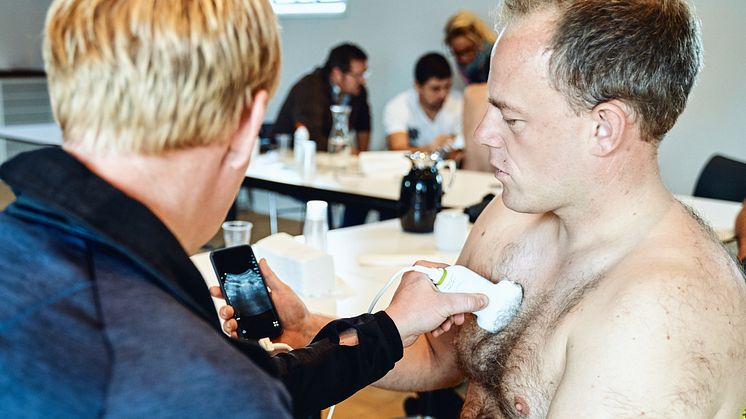 Paramedics are being trained to perform blood tests and ultrasound-scan lungs with mobile equipment, enabling them to diagnose and treat chronic disease patients in their homes. Photo: Falck