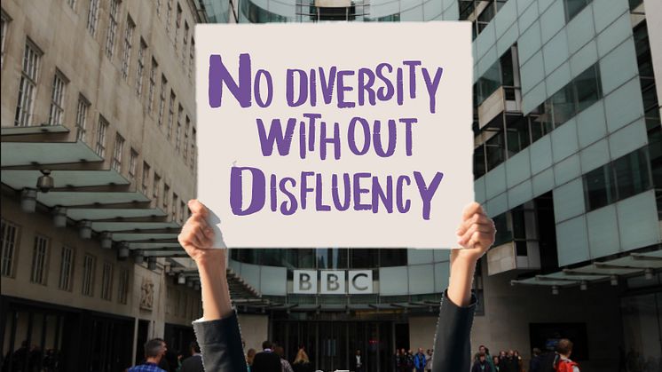 Hands holding up a placard saying No Diversity Without Disfluency