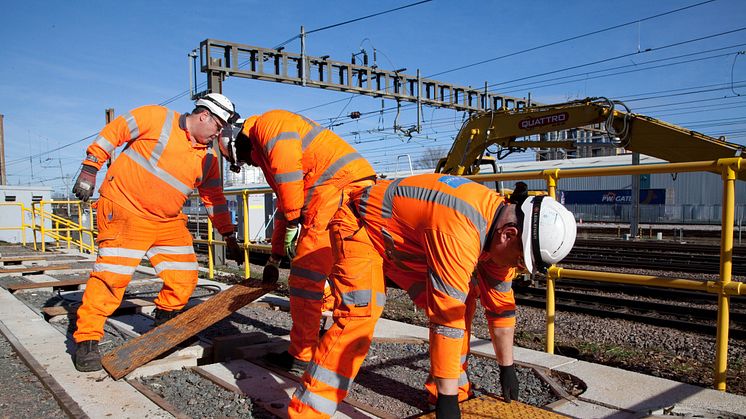 Engineers fitting new cables for the East Coast Main Line digital signalling programme [downloadable images below]