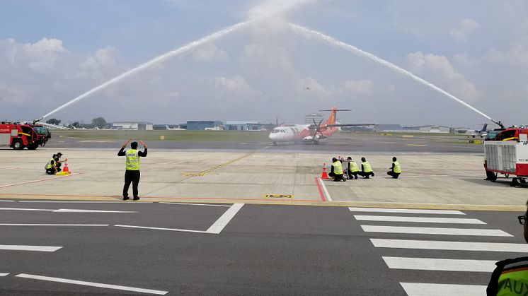 FY3126 welcomed with a water canyon salute on its inaugural flight into Seletar Airport