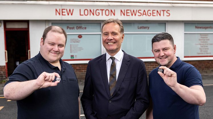 Pride 50p coin roll out. Left to right: Postmaster Daniel Cooper, The Royal Mint's Managing Director, Currency, Andrew Mills and postmaster Nathan Jones 