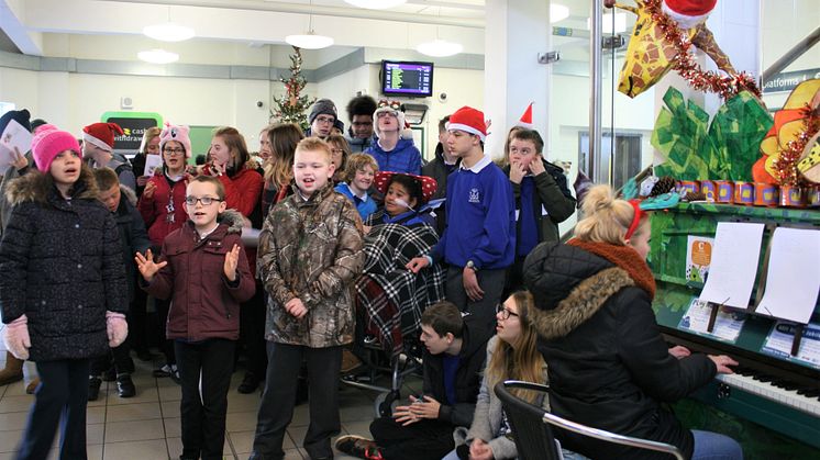 Children sang carols and made decorations for a Christmas tree at Horsham station - MORE IMAGES AVAILABLE TO DOWNLOAD BELOW