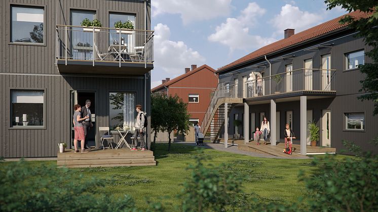 Illustration av det nya kvarteret BoKlok Krysset i Bålsta, med balkonger/altaner samt gemensamma grönytor och naturliga mötesplatser. 