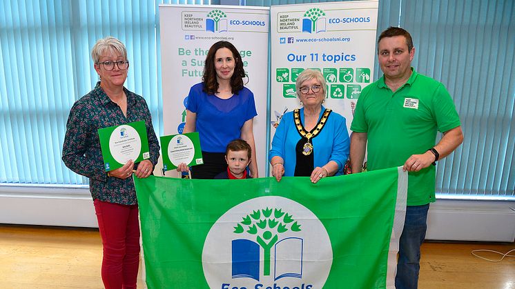 Deputy Mayor, Cllr Beth Adger MBE, with staff, and a pupil, from Clough Primary School Nursery Unit at the Eco-Schools Green Flag Awards.