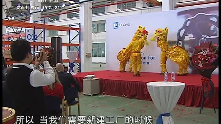 The grand opening of new factory in China on the TV news
