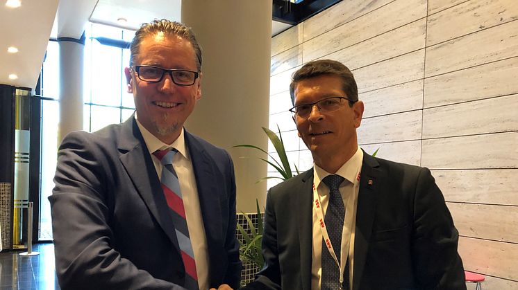 Remi Eriksen, Group President and CEO of DNV GL, with KONGSBERG President and CEO Geir Håøy 