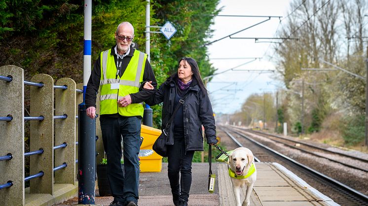 Mobile Assistance Team member Keith Williamson assists Diane Rose at Meldreth station - download this and more pictures below