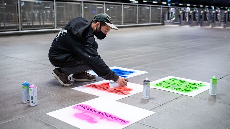 Messages of hope are applied in the early hours at Blackfriars station