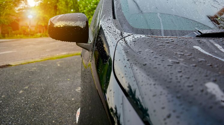 Water droplets evaporating on the surface of a car