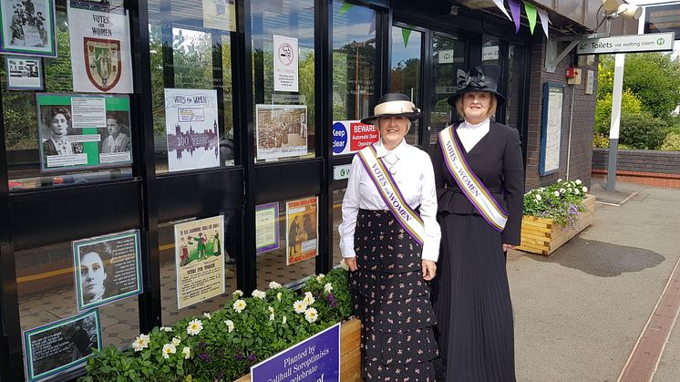 Station adopters at Widney Manor station show off a seasonal display at the station