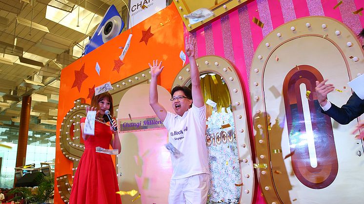  An ecstatic Mr Peh when he drew the correct key that opened the winning door to the million-dollar fortune.