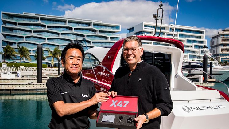 Yanmar’s Ken Araki and Christopher Anand of NEXUS with the X47 Express Cruiser