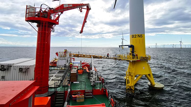The 'Esvagt Dana's gangway can operate to both sides and safely transfer technicians to the offshore wind turbine.