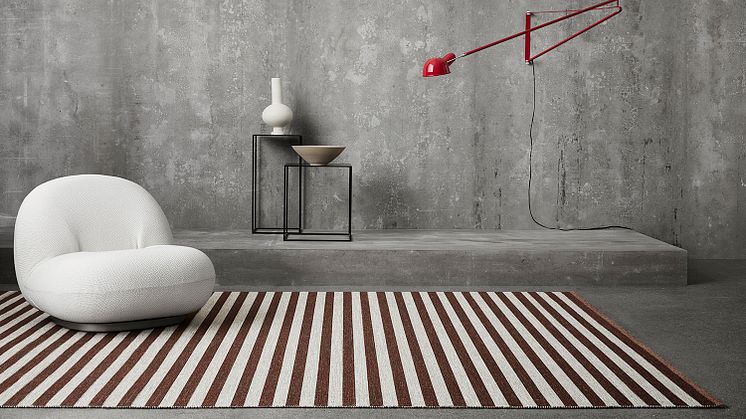 Narrow Stripe Icon, a woven rug in the finest wool with exciting color combinations and a graphic pattern.