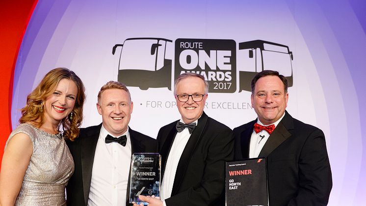 L-R: routeone Awards presenter Katie Derham, Go North East's Head of Engineering Colin Barnes, Freight Transport Association Chief Executive David Wells and routeone Editor Mel Holley