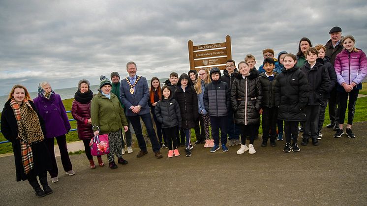 Volunteers, school children and Council representatives gathered for the official opening of Blackhead Path as a Local Nature Reserve. 