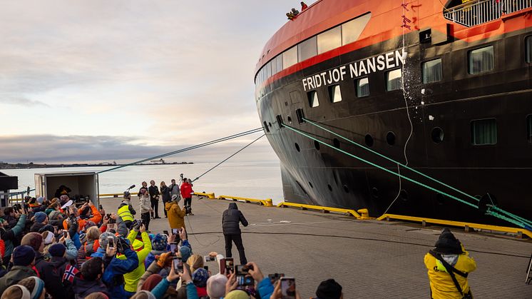 ARCTIC NAMING: Ice breaks agains the hull as battery-hybrid MS Fridtjof Nansen was named in a ceremony at home in Longyearbyen, Svalbard. PHOTO: Espen Mills/Hurtigruten Expeditions