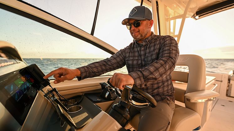 High res image - Raymarine - Axiom+ Captain at the helm