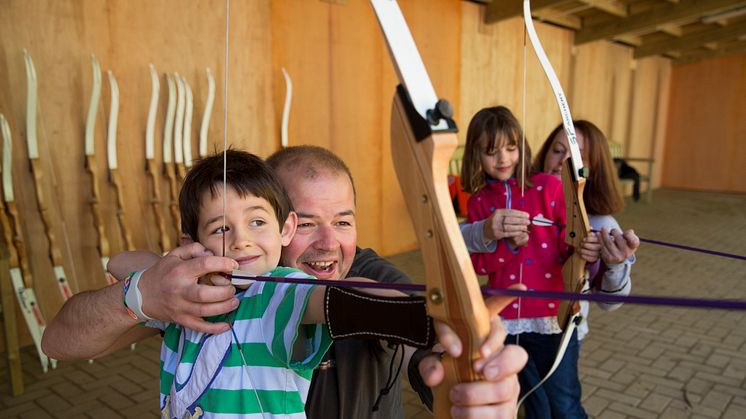 Children master their skills at the Robin Hood and Little Johns Archery session