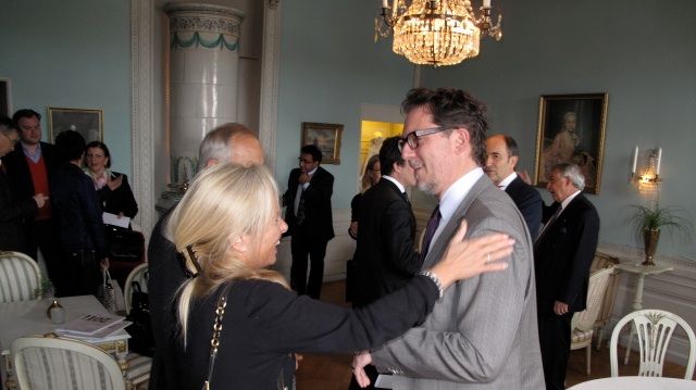 Pia Hellman greets Open's David Gray during Cavotec's AGM in Stockholm