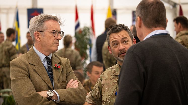 Systematic UK's Vice President James Hamilton (left) discusses the JEF exercise on the Distinguished Visitors Day (Credit: Crown Copyright)
