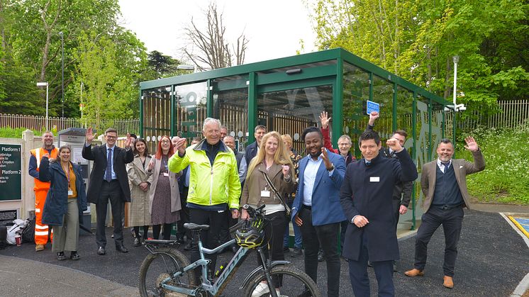 Green machines: train company, Council and community celebrate Kenley's new cycle hub. (Front row L to R) bike shop owner Ray Wookey, Cllr Gayle Gander, Cllr Ola Kolade, Southern Head of Stations Stephen MacCallaugh