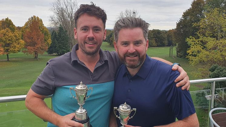 Kevin Redman, right, pictured before his stroke with golf partner Sean Gay when they were pairs champions at Coombe Wood Golf Club in Kingston Upon Thames