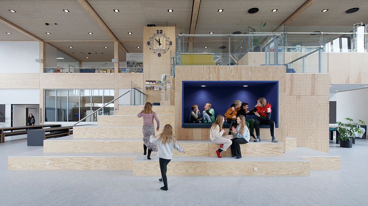 The central indoor square at Erlev School is used for both gatherings, play and learning.