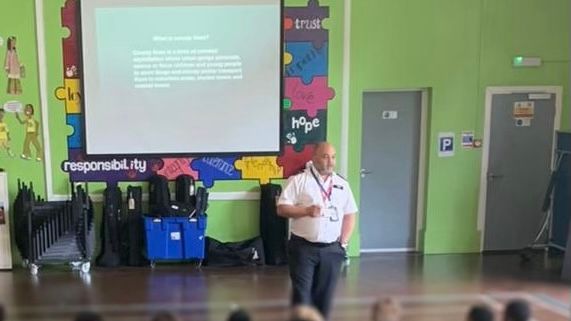 Officers giving anti-knife crime presentation to students in Croydon